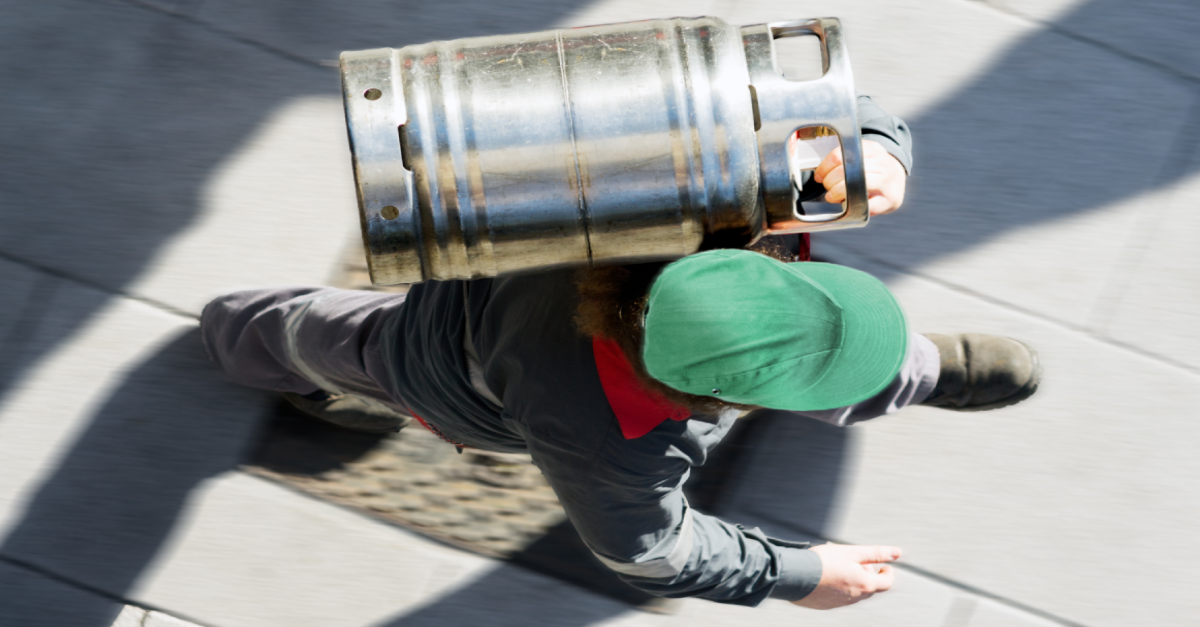 man delivering gas tank